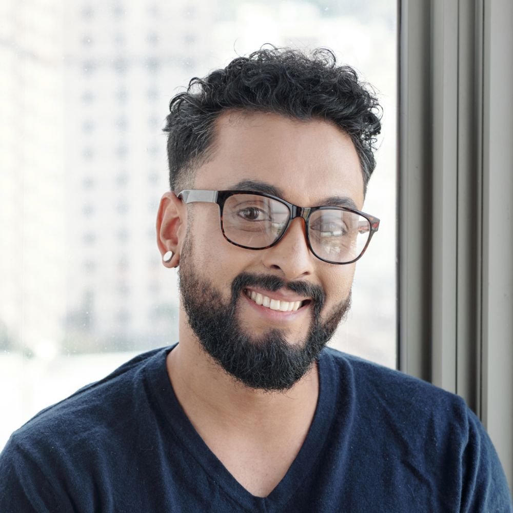 Testimonials handsome smiling man in glasses 5yveydz 1.jpg